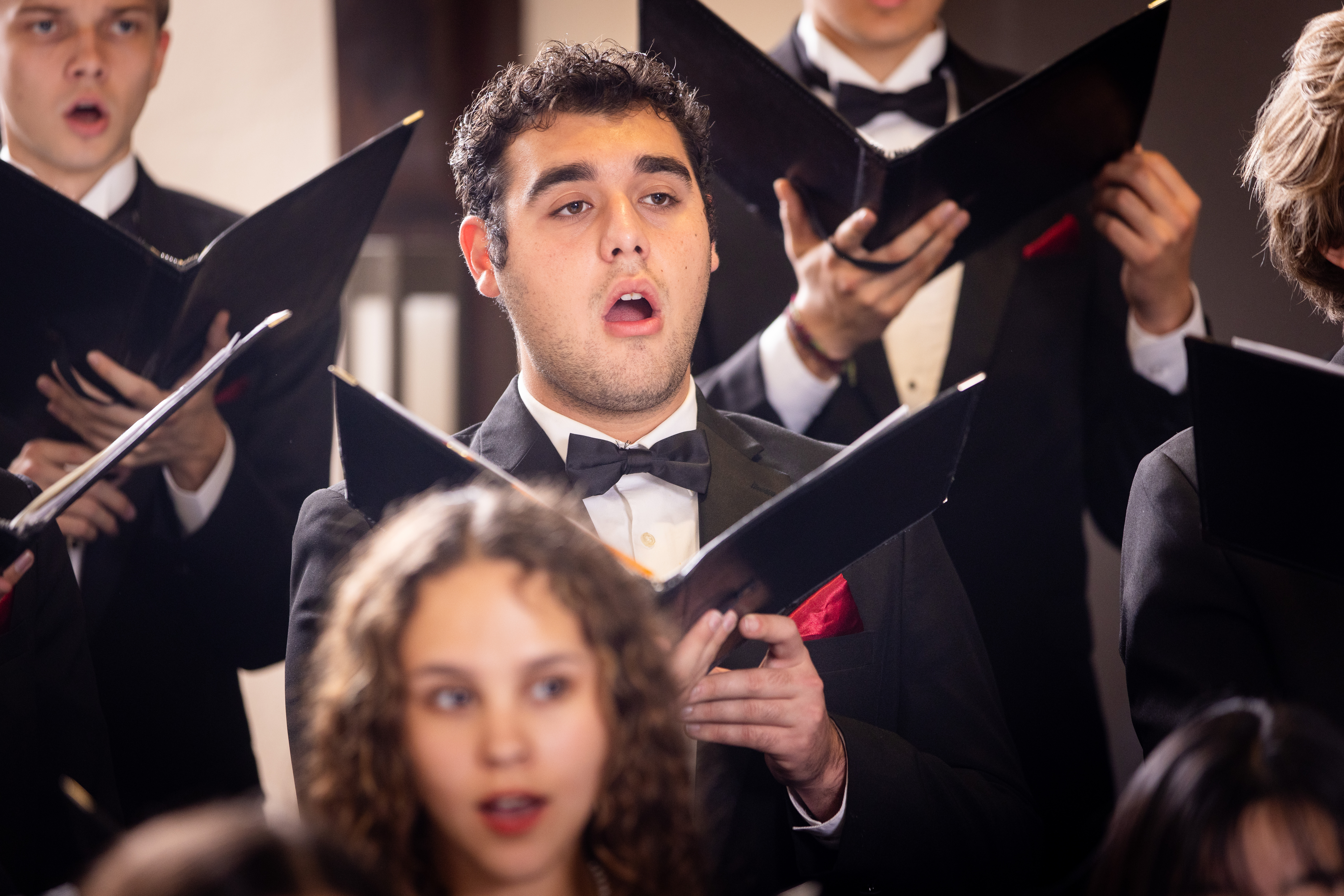 Male Student singing in choir