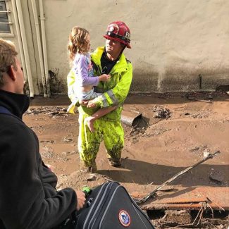 Westmont professor Tom Walters waits as his daughter is rescued by first responders following the deadly Montecito mudslide.