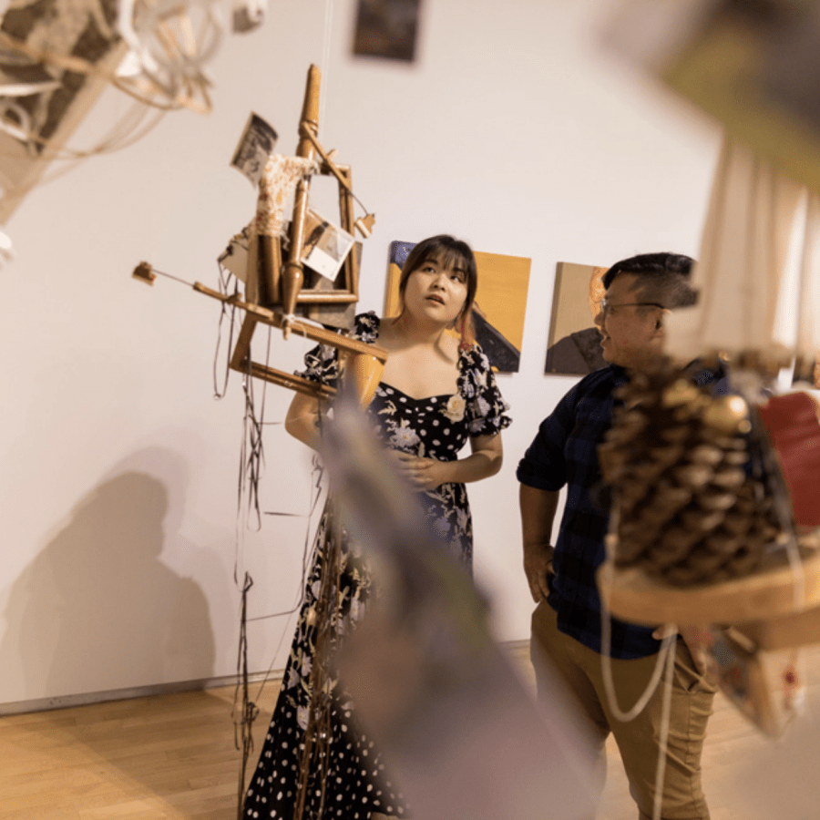 westmont female art student at show