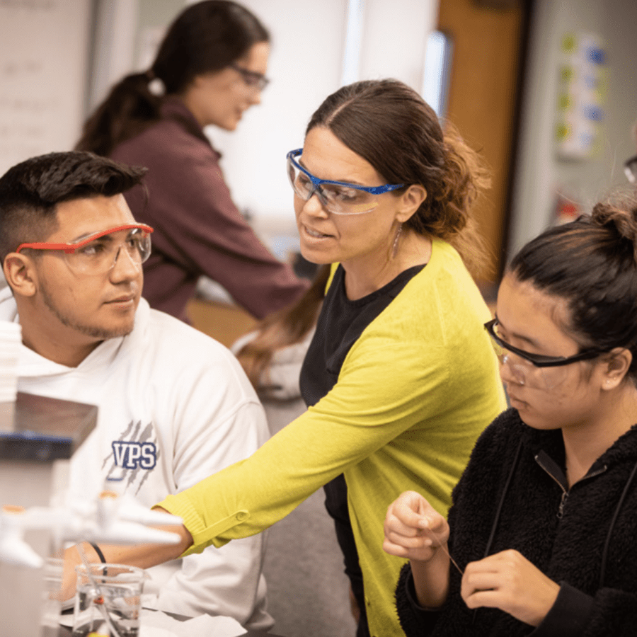 chemistry professor and students in lab